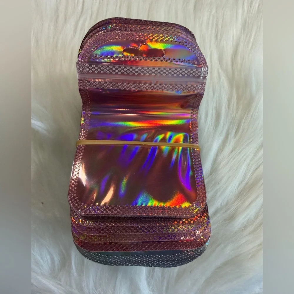 💜3/$15   50 pieces Holographic Pink Pouches